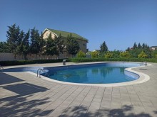 Novxanıda villa satılır 40 sot, 3 mərtəbə, 7 otaqlı, -4