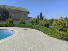 Novxanıda villa satılır 40 sot, 3 mərtəbə, 7 otaqlı, -5