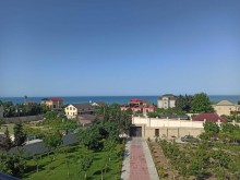 Novxanıda villa satılır 40 sot, 3 mərtəbə, 7 otaqlı, -9