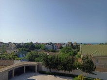 Novxanıda villa satılır 40 sot, 3 mərtəbə, 7 otaqlı, -12