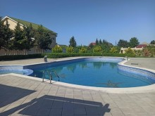 Novxanıda villa satılır 40 sot, 3 mərtəbə, 7 otaqlı, -18