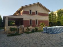 Novxanı qəsəbəsi elit məhəllədə  14 sot ərazidə təmir villa satılır., -4