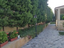 Novxanı qəsəbəsi elit məhəllədə  14 sot ərazidə təmir villa satılır., -5