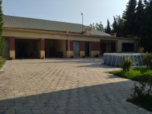 Novxanı qəsəbəsi elit məhəllədə  14 sot ərazidə təmir villa satılır., -15
