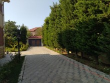 Novxanı qəsəbəsi elit məhəllədə  14 sot ərazidə təmir villa satılır., -18