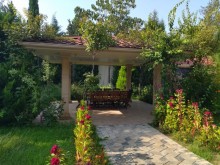 Novxanı qəsəbəsi elit məhəllədə  14 sot ərazidə təmir villa satılır., -19