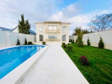 A 2-storey villa built on a 7 sot plot of land is for sale in Merdekan, -3