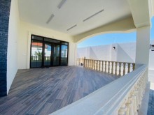 A 1-story villa built on a 7.5 sot plot in Mardakan near the Bravo market, -16