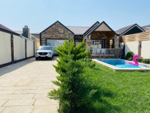 The villa in Merdekan is located on Bravo market road, -17