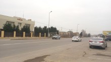 Novxanida grand marketin etrafinda torpaq satilir, -7