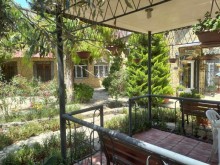 A 2-story garden house full of pine trees in Baku, -5