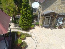 A 2-story garden house full of pine trees in Baku, -17