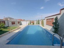 A modern mini villa is for sale in Merdekan village, -6
