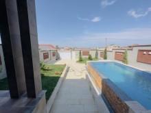 A modern mini villa is for sale in Merdekan village, -7