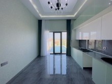 A modern mini villa is for sale in Merdekan village, -17