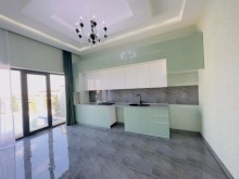 A modern mini villa is for sale in Merdekan village, -18