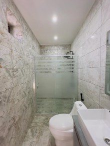 A modern mini villa is for sale in Merdekan village, -19