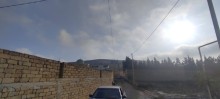 Novxani torpaq satisi 17 sot, -5