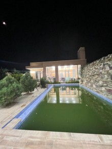 A 4-room courtyard house is for sale in Mardakan settlement in Baku, -11