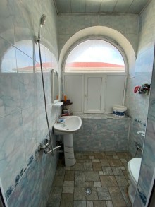 A house is for sale in one of the central streets of Novkhani, -14