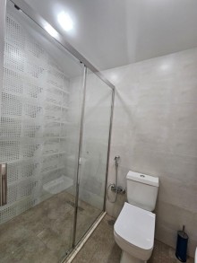 A new house with a sea view is for sale in Baku in Shuvelan settlement. House 5 rooms, -15