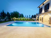 A 2-storey Mediterranean-style house is for sale in Baku city, -8