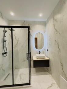 A 2-storey Mediterranean-style house is for sale in Baku city, -17