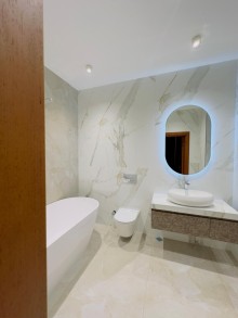 A 2-storey Mediterranean-style house is for sale in Baku city, -18