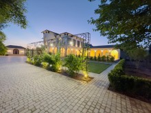 A 2-storey Mediterranean-style house is for sale in Baku city, -20