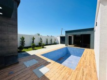 A new modern house with a swimming pool is for sale in Baku on the Shuvelan Park road, -4