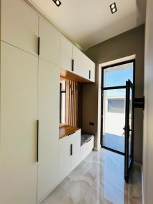 A new modern house with a swimming pool is for sale in Baku on the Shuvelan Park road, -8