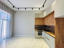 A new modern house with a swimming pool is for sale in Baku on the Shuvelan Park road, -10