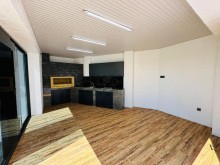 A new modern house with a swimming pool is for sale in Baku on the Shuvelan Park road, -12