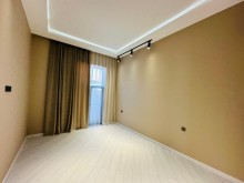 A new modern house with a swimming pool is for sale in Baku on the Shuvelan Park road, -16