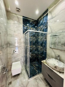 A new modern house with a swimming pool is for sale in Baku on the Shuvelan Park road, -18