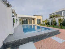 A one-story 4-room new villa is for sale in Baku on the Shüvelan Seaside Road, -2