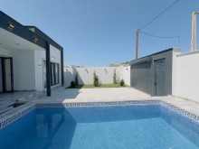 A modern one-storey villa is for sale in Baku, -5