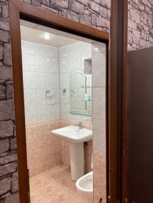 A single-story cottage is for sale in Şüvəlan, -17