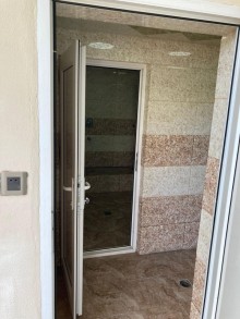 A single-story cottage is for sale in Şüvəlan, -18