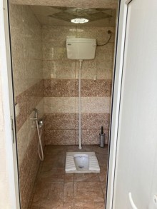 A single-story cottage is for sale in Şüvəlan, -20