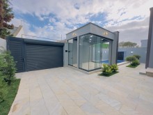 A new one-story house is for sale in Mardakan. Built on a 3-sot plot, -2