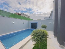 A new one-story house is for sale in Mardakan. Built on a 3-sot plot, -3
