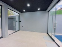 A new one-story house is for sale in Mardakan. Built on a 3-sot plot, -4