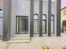 A new one-story house is for sale in Mardakan. Built on a 3-sot plot, -7