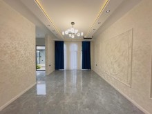 A new one-story house is for sale in Mardakan. Built on a 3-sot plot, -8