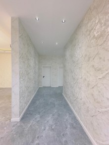 A new one-story house is for sale in Mardakan. Built on a 3-sot plot, -10