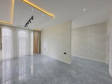 A new one-story house is for sale in Mardakan. Built on a 3-sot plot, -15