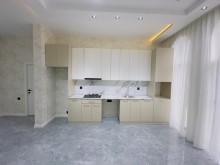 A new one-story house is for sale in Mardakan. Built on a 3-sot plot, -17
