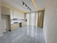 A new one-story house is for sale in Mardakan. Built on a 3-sot plot, -18