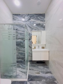 A new one-story house is for sale in Mardakan. Built on a 3-sot plot, -19